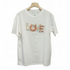 Camiseta con letras love bordadas