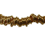 Pulsera Júpiter detalle macro espiral aros entrelazados metal bañado oro joyería Angara Moda