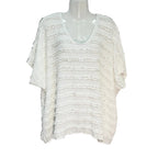 Blusa Marisa oversize con volantes y cuello en V manga corta