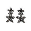 Pendientes Nenúfar Doble Flor Metal Acabado Espejo Oversize