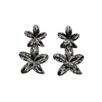 Pendientes Nenúfar Doble Flor Metal Acabado Espejo Oversize