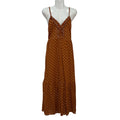 Vestido lucero maxi de lunares con escote en V, volante y lazada