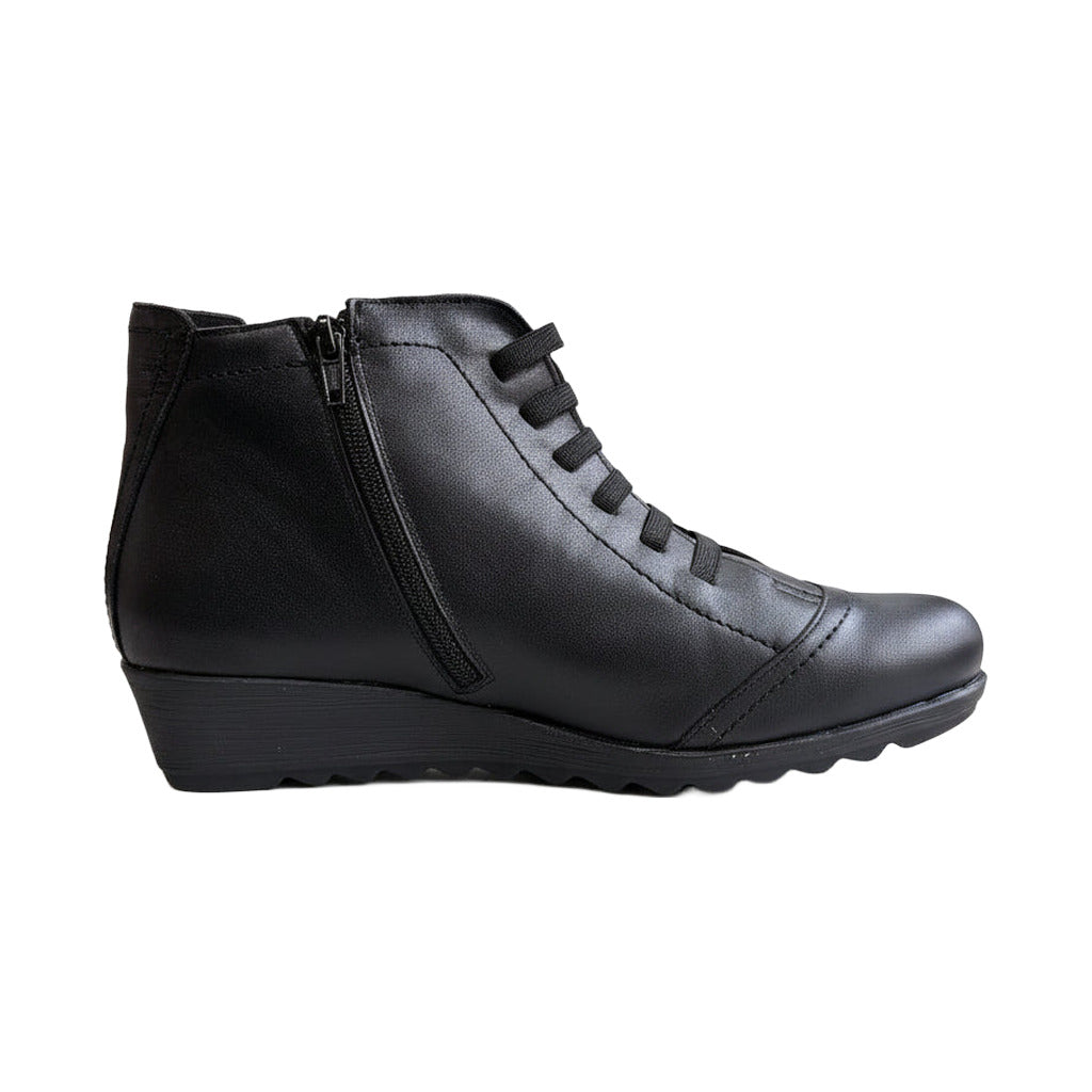 Botin señora piel en color único sobre fondo blanco para mujer Angara Moda