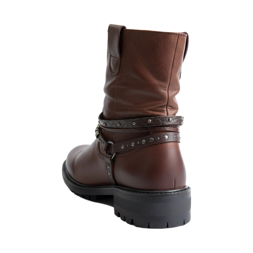 Botin motero sobre fondo blanco, vista lateral para mujer Angara Moda