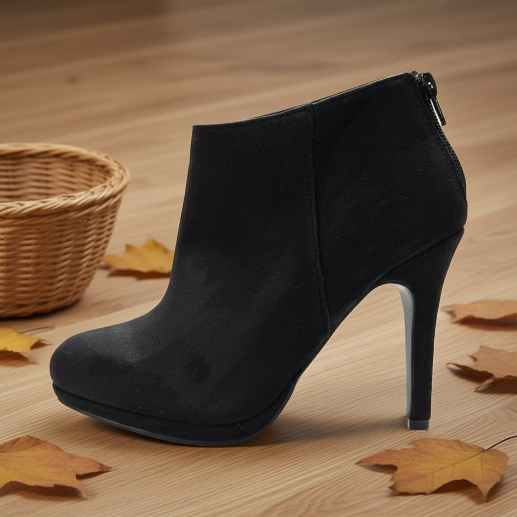 Botin tacon crazy sobre una superficie para mujer Angara Moda