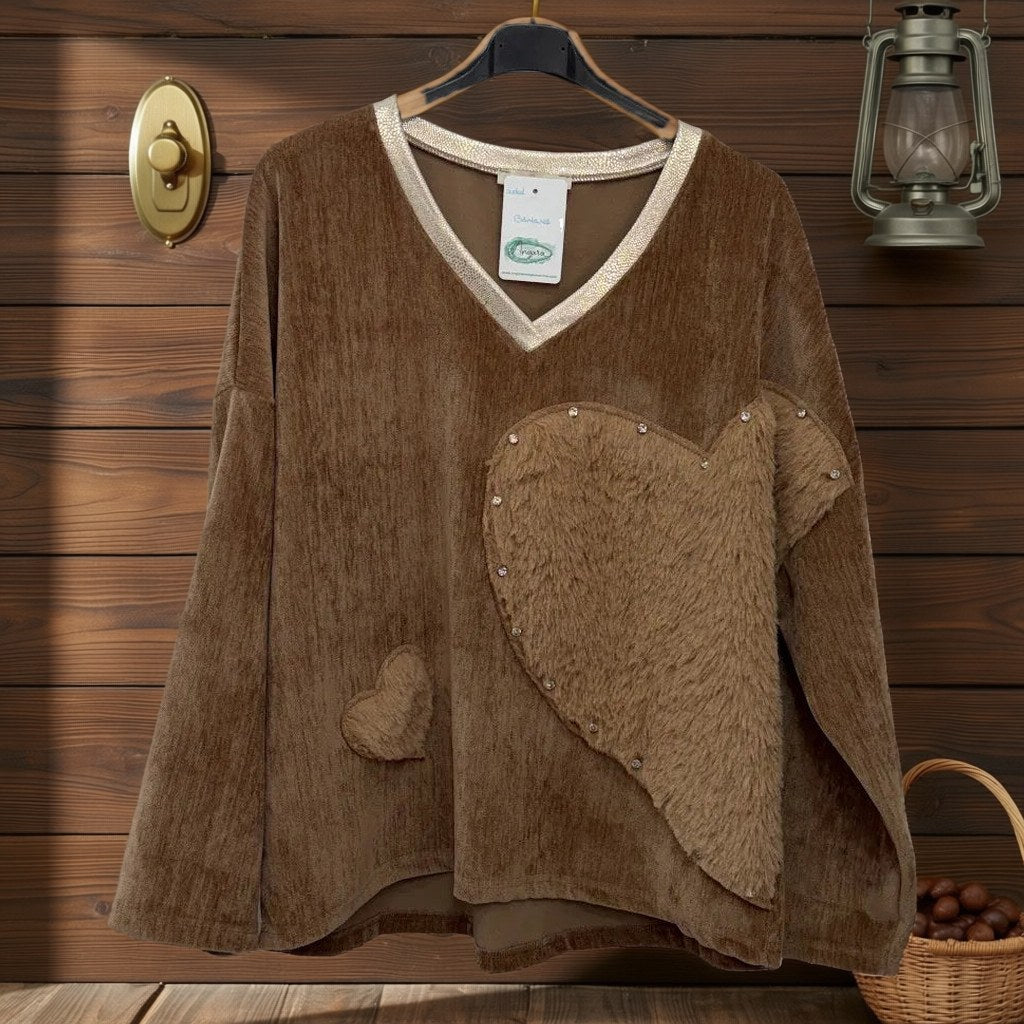 Sudadera Banana colgada en un ambiente para mujer Angara Moda