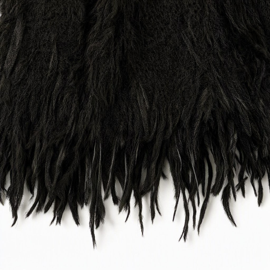 Detalle del tejido de Chaleco pegui para mujer Angara Moda