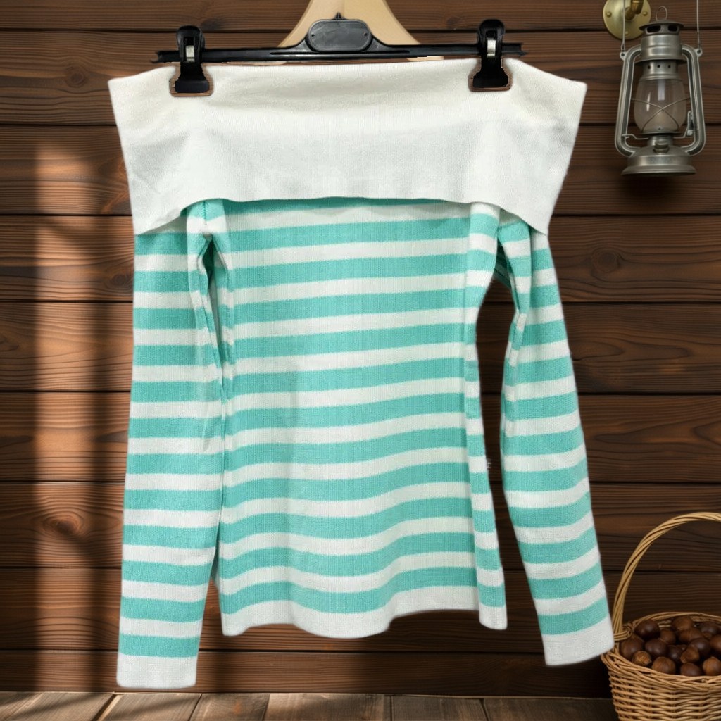 Jersey Jaco colgada en un ambiente para mujer Angara Moda