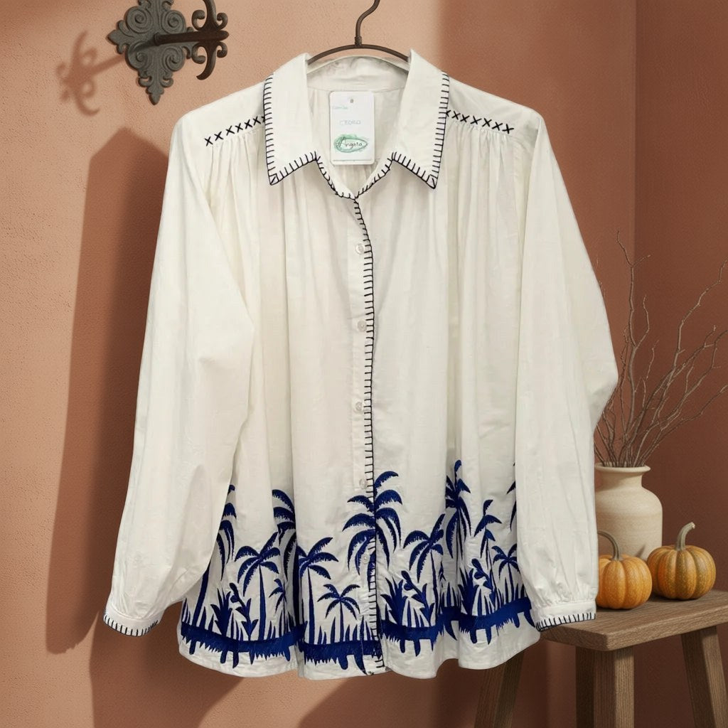 Camisa Cedro algodón bordado palmeras artesanal pespuntes decorativos tropical colgada en un ambiente para mujer Angara Moda
