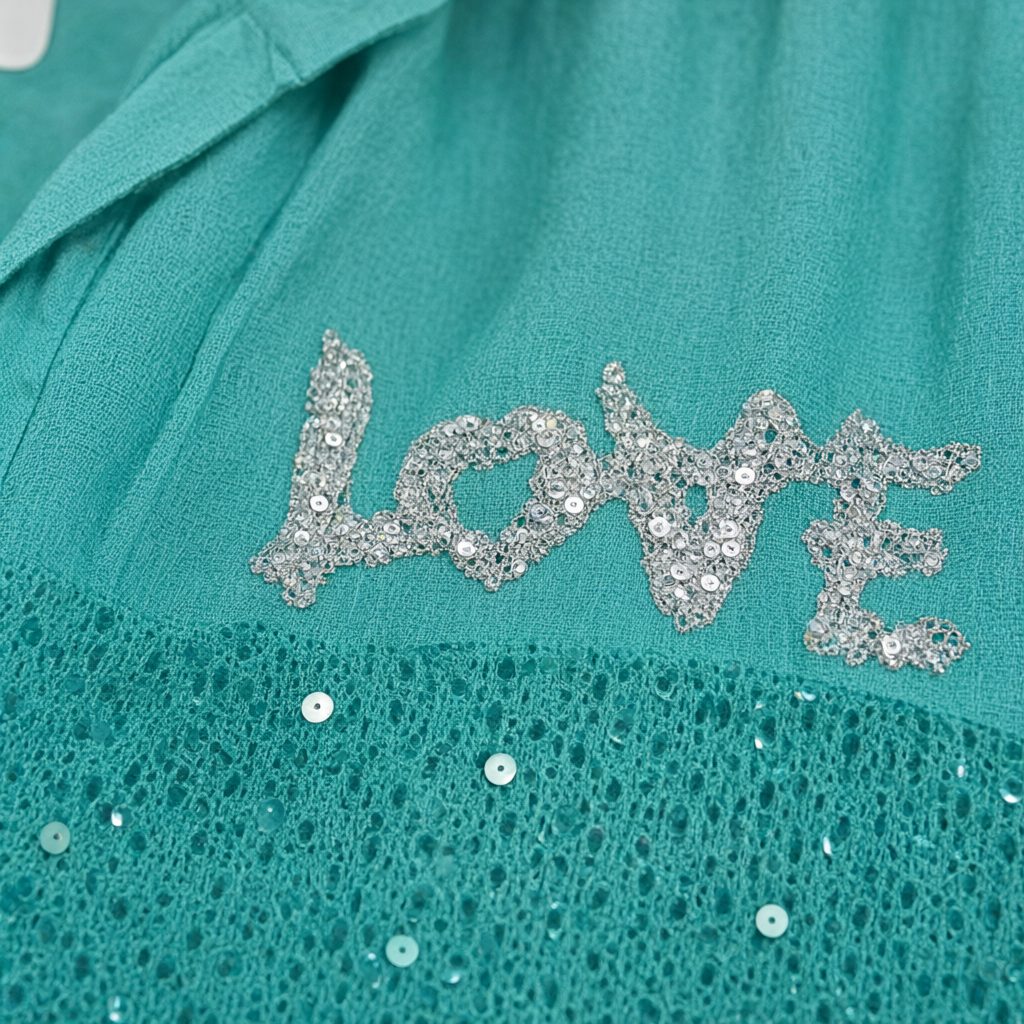 Detalle del tejido de Camisa infiniti para mujer Angara Moda