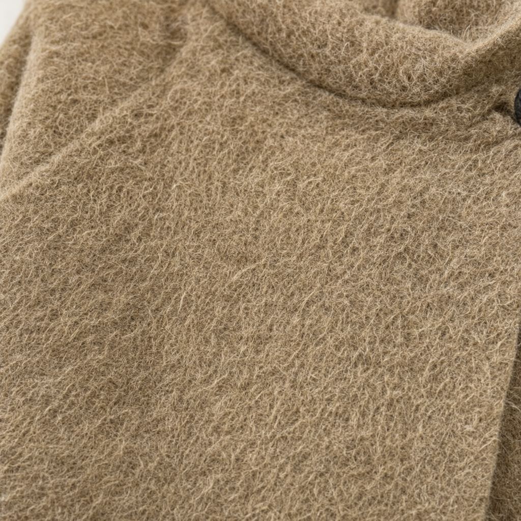 Detalle del tejido de chaqueta Aby25 para mujer Angara Moda