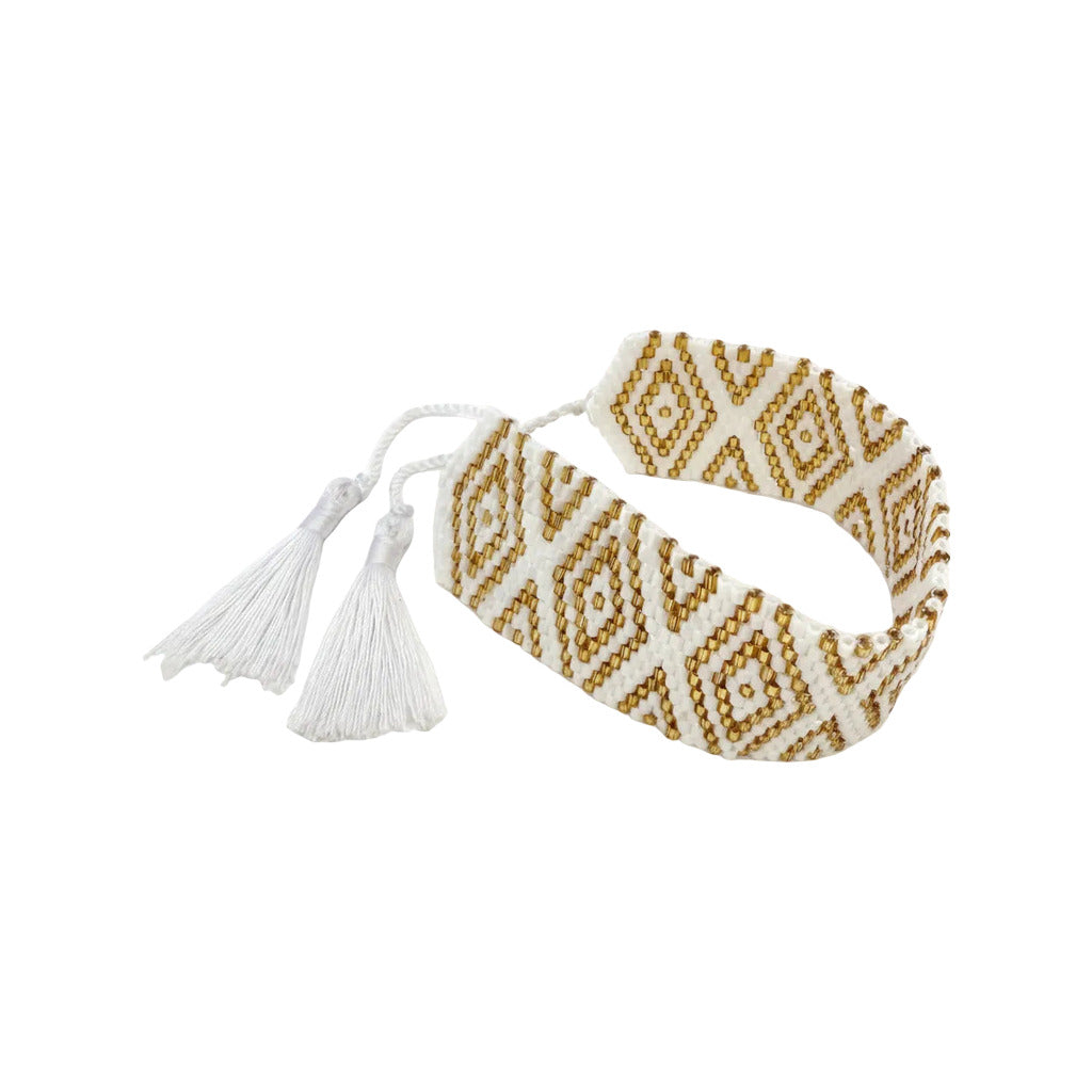 Pulsera icnita sobre fondo blanco para mujer Angara Moda