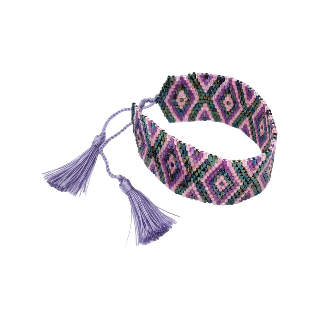 Pulsera icnita en color Lila sobre fondo blanco para mujer Angara Moda