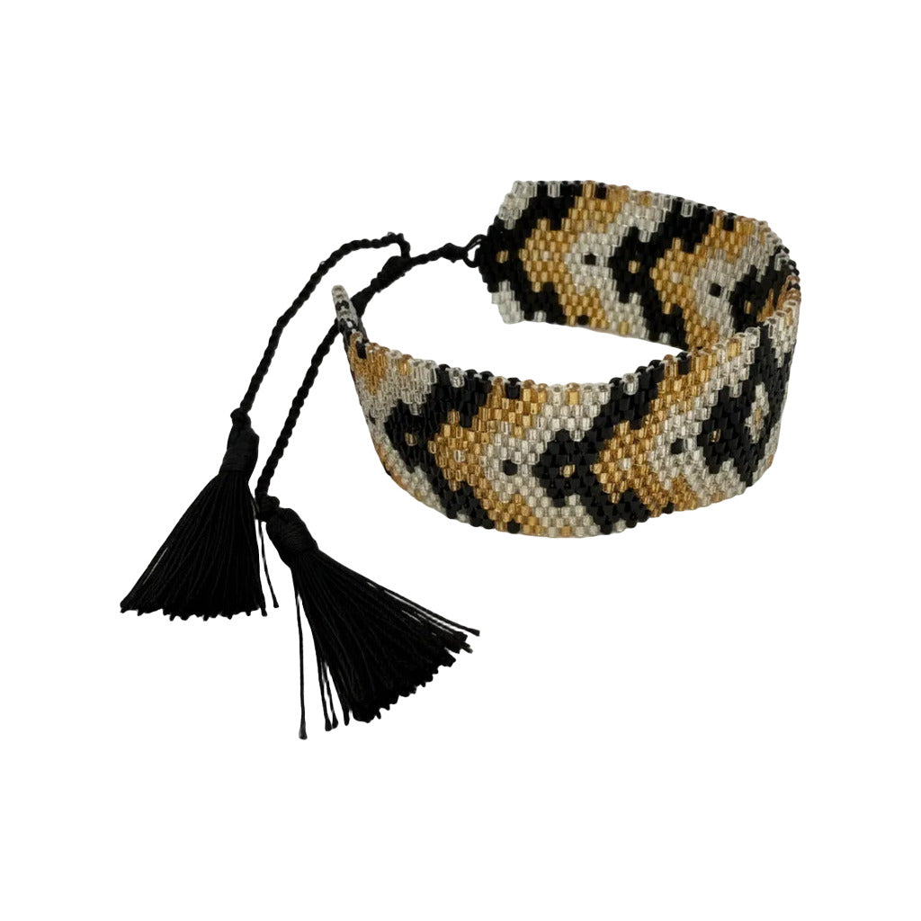 Pulsera icnita en color Negro sobre fondo blanco para mujer Angara Moda