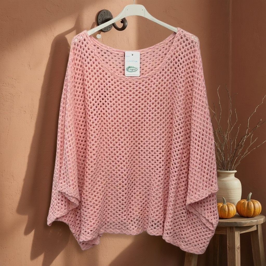 Jersey colmena colgada en un ambiente para mujer Angara Moda