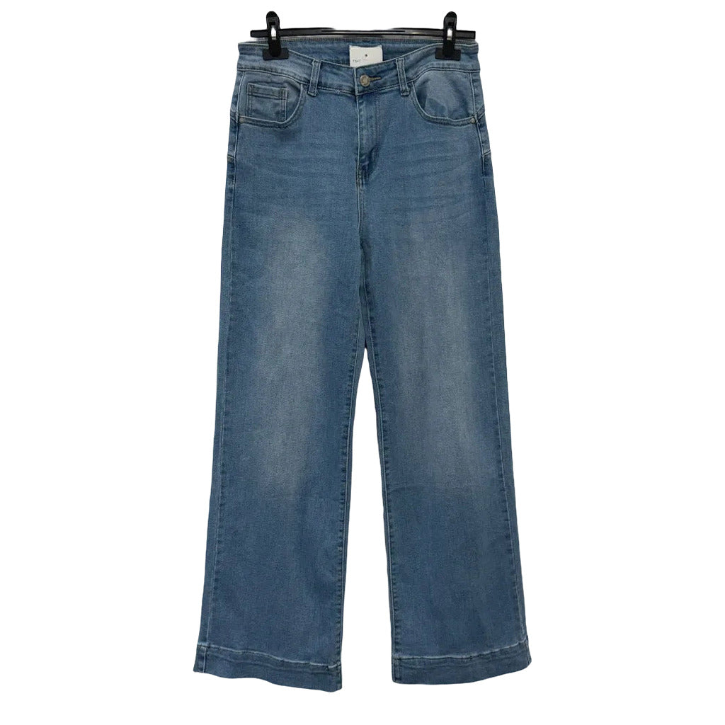 Pantalón Vaquero split en color único sobre fondo blanco para mujer Angara Moda