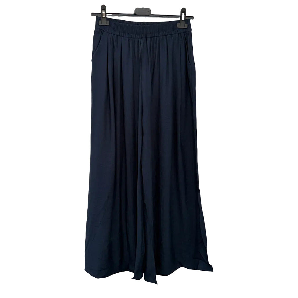 Pantalones palazzo capricornio en color Azul marino sobre fondo blanco para mujer Angara Moda