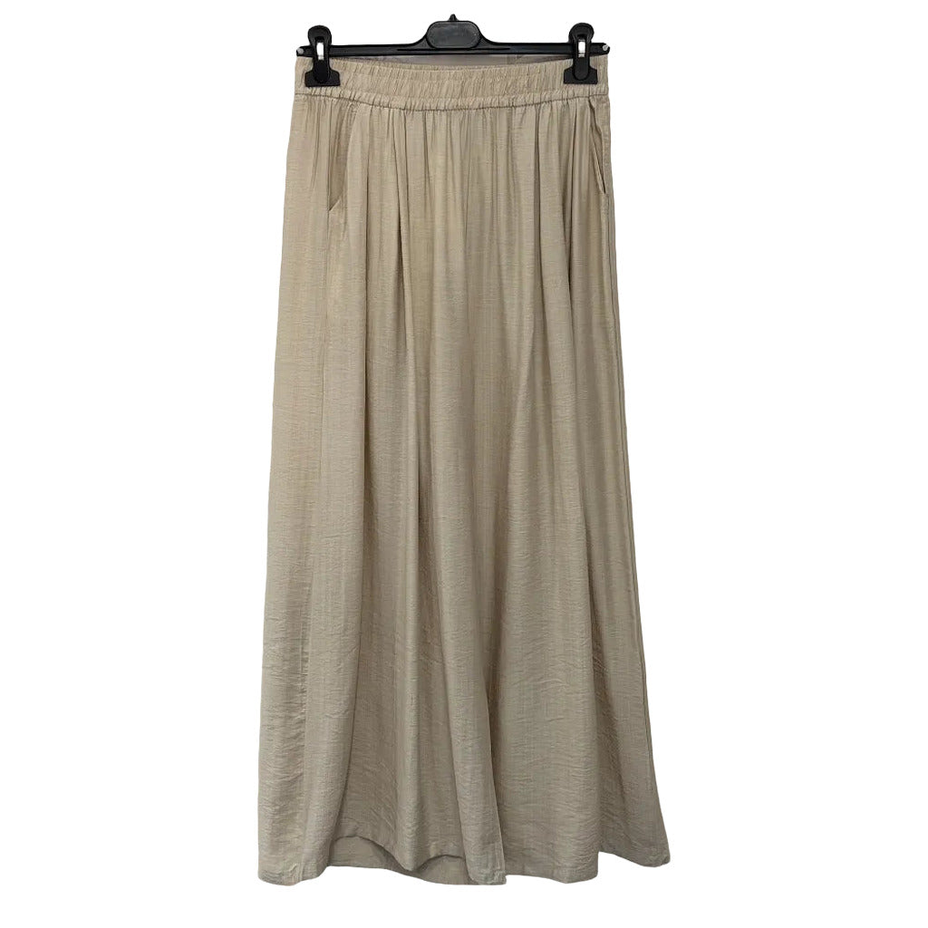 Pantalones palazzo capricornio en color Beige sobre fondo blanco para mujer Angara Moda