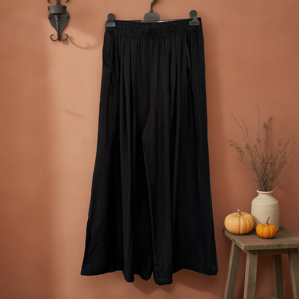 Pantalones palazzo capricornio colgada en un ambiente para mujer Angara Moda