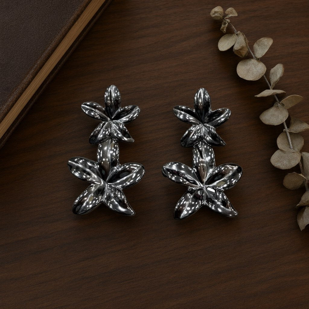 Pendientes Nenúfar Doble Flor Metal Acabado Espejo Oversize desde arriba para mujer Angara Moda
