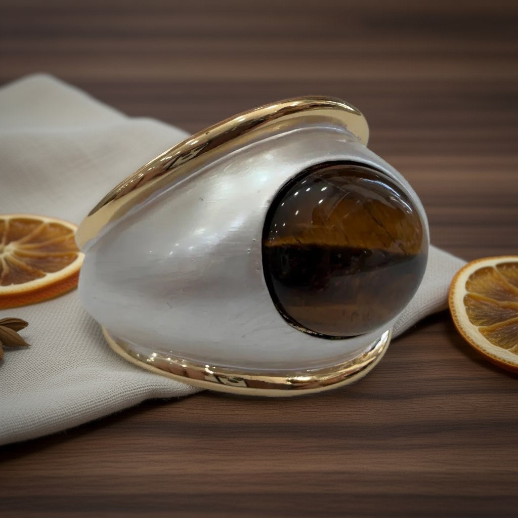 Brazalete ostra sobre una superficie para mujer Angara Moda
