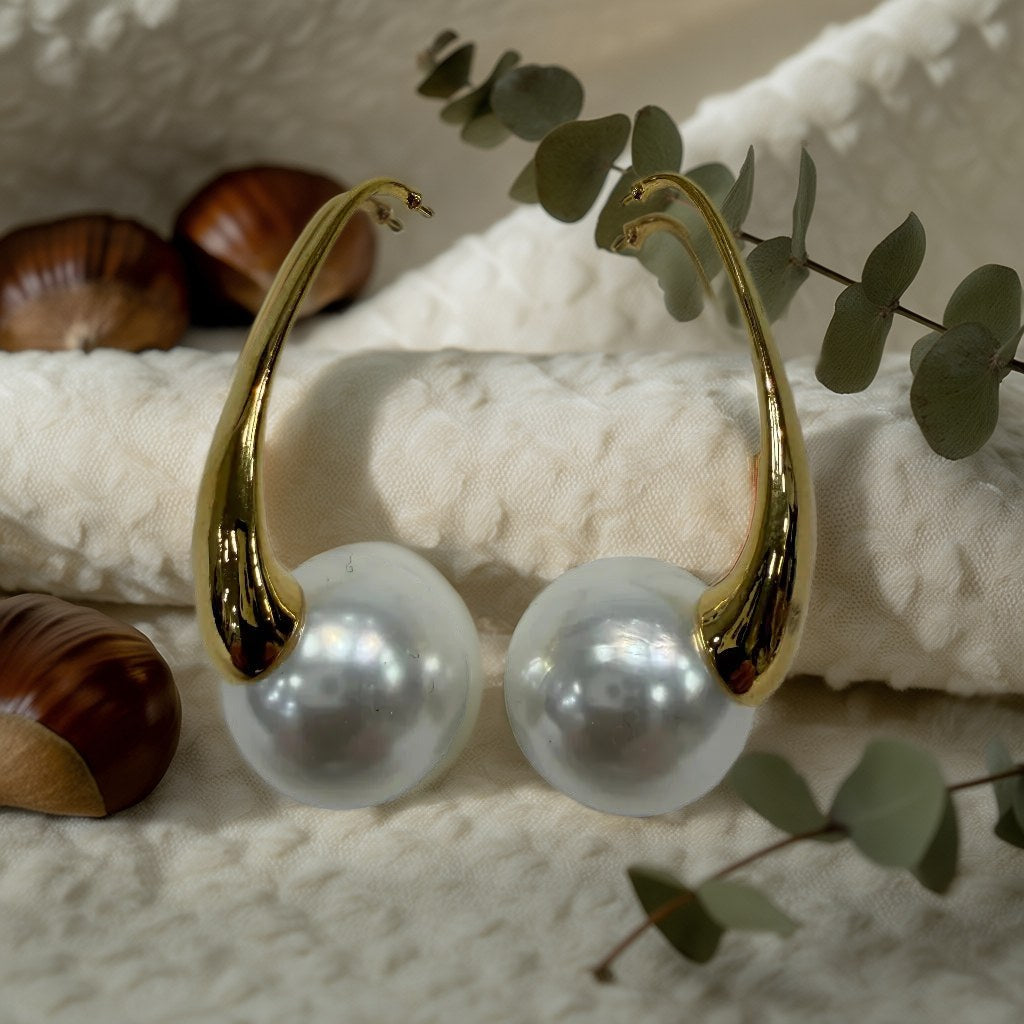 Pendientes gafitas sobre una superficie para mujer Angara Moda