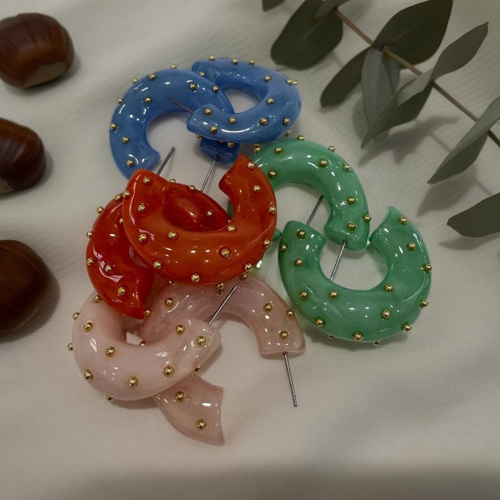 Pendientes brownie sobre una superficie para mujer Angara Moda