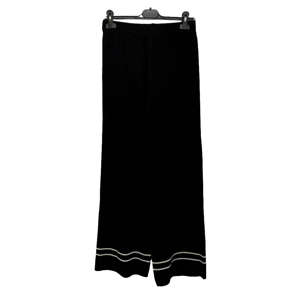Conjunto pomelo sobre fondo blanco, vista lateral para mujer Angara Moda