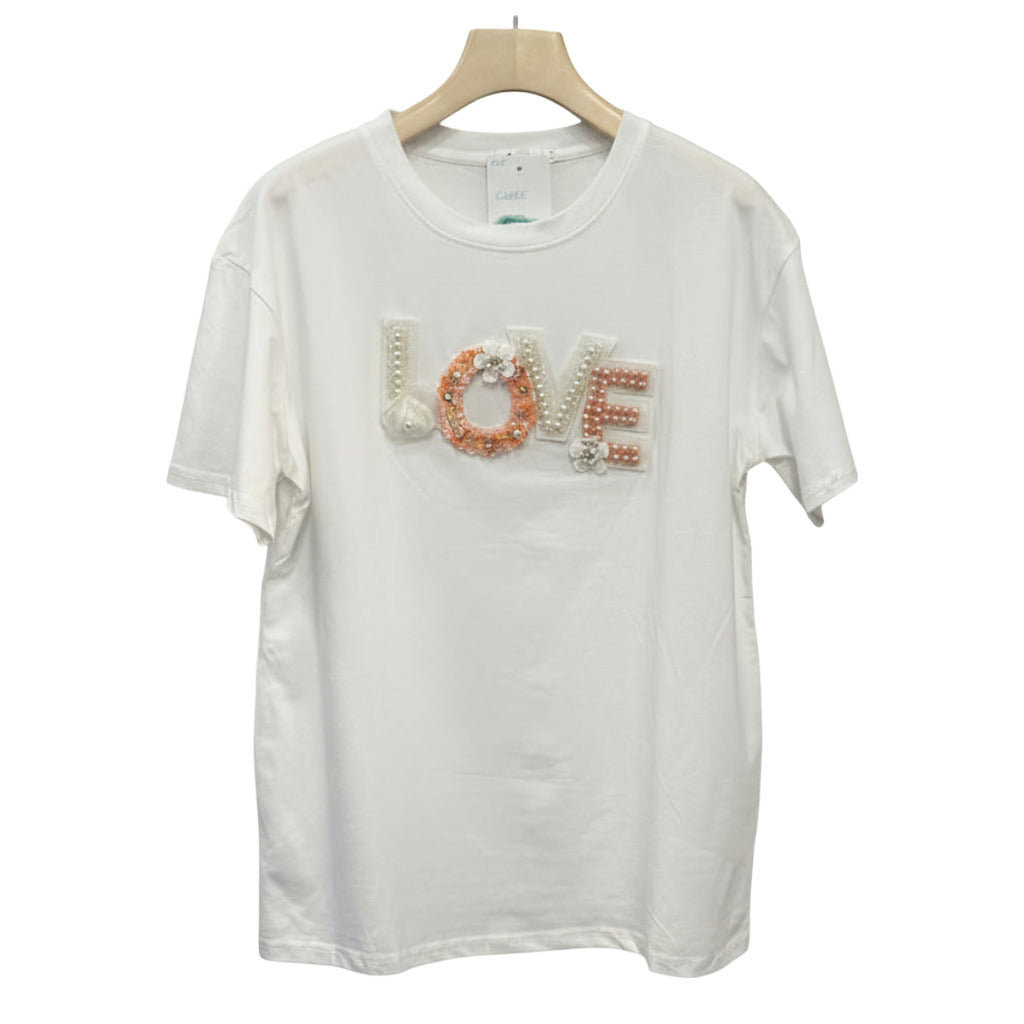 Camiseta Cuore algodón manga corta aplique LOVE perlas lentejuelas sobre fondo blanco para mujer Angara Moda