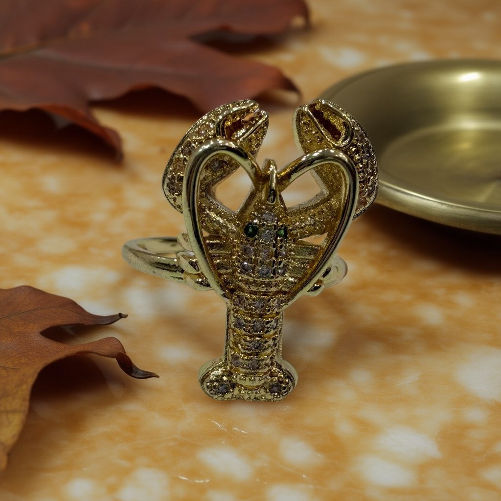 Anillo abierto langosta con microcirconitas y ojos verdes ajustable sobre una superficie para mujer Angara Moda