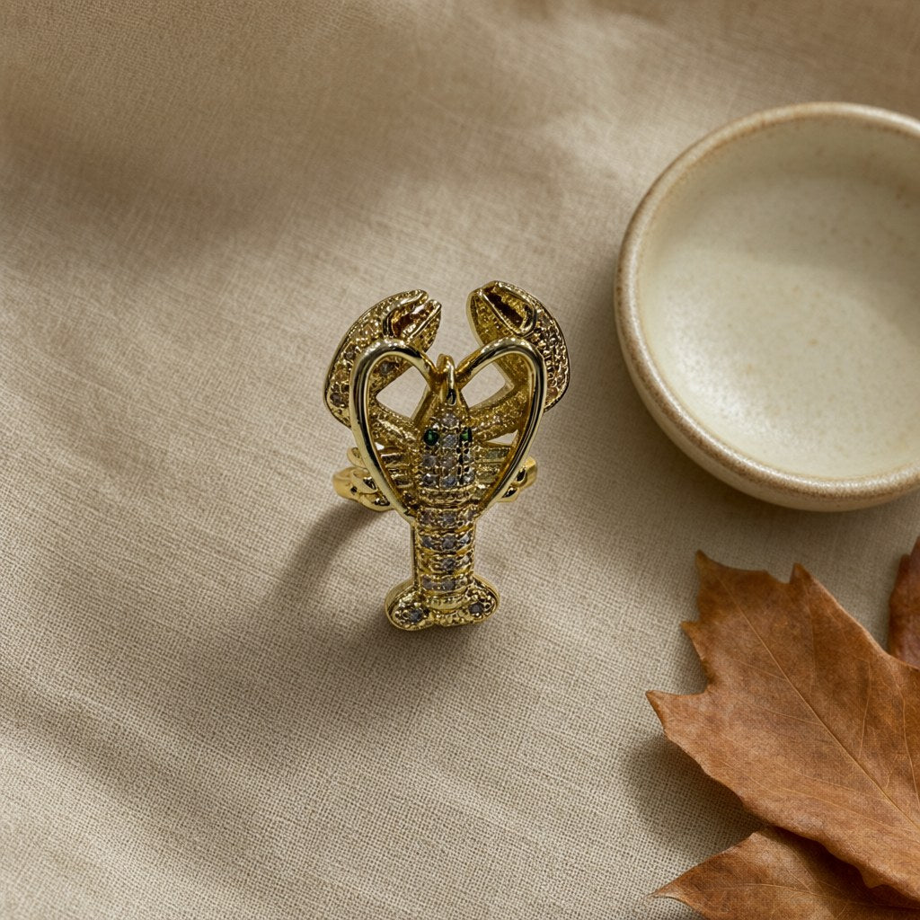 Anillo abierto langosta con microcirconitas y ojos verdes ajustable desde arriba para mujer Angara Moda