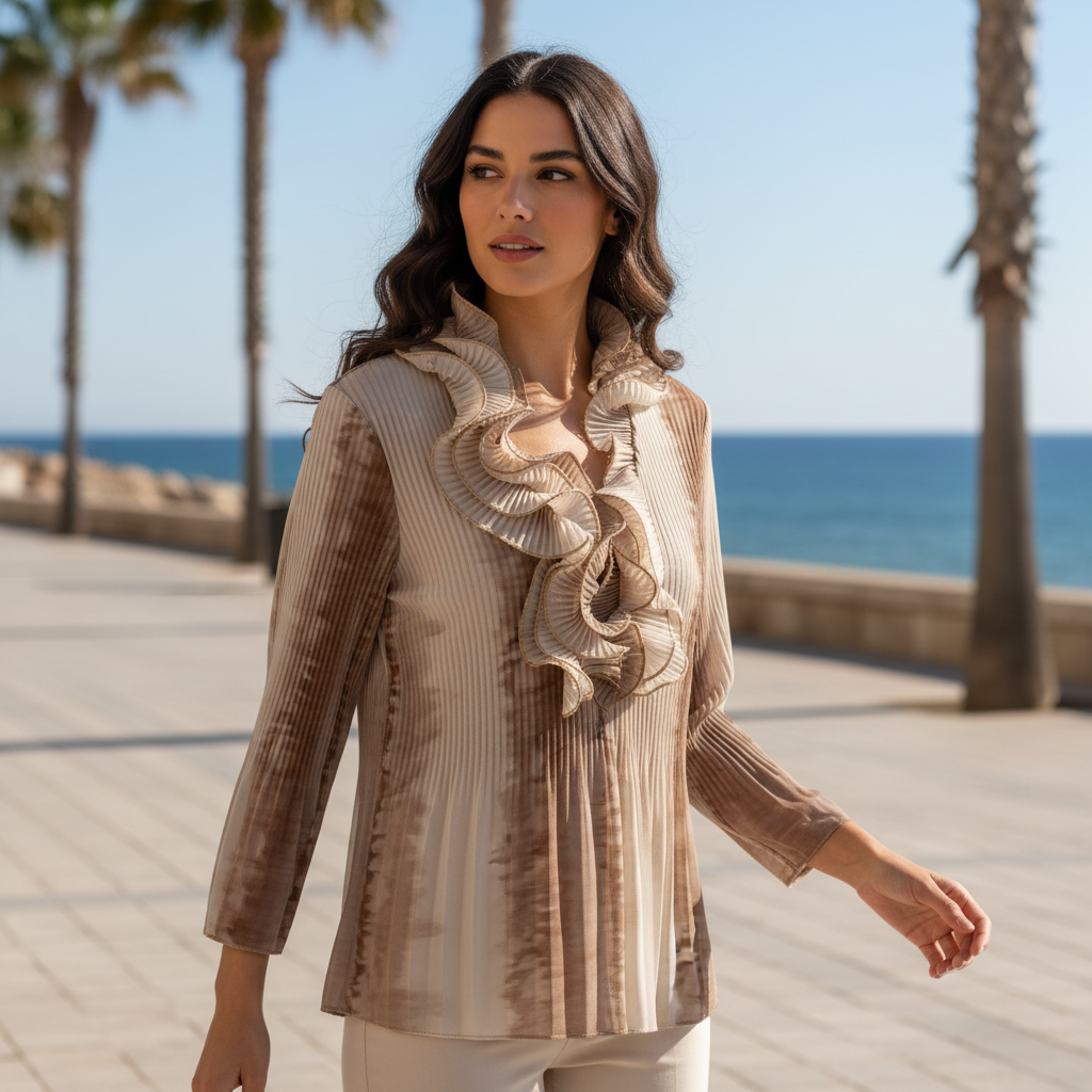 Blusa ceremonia volantes plisados tejido fluido modelo paseo marítimo Angara Moda