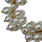 Macro racimo perlas nacaradas aro dorado detalle material Angara Moda