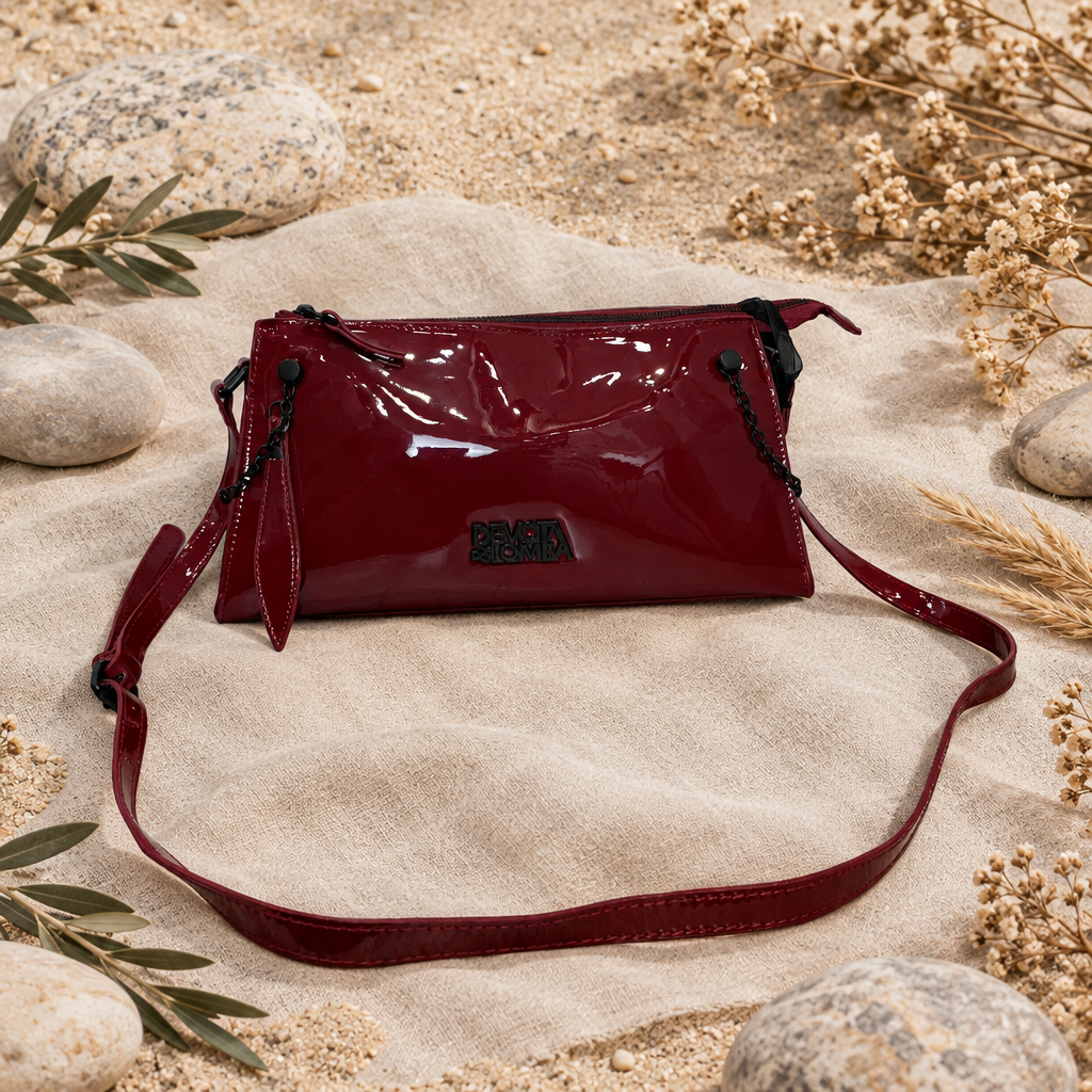 Bandolera Nieves de acabado brillante burdeos en fondo natural para mujer Angara Moda